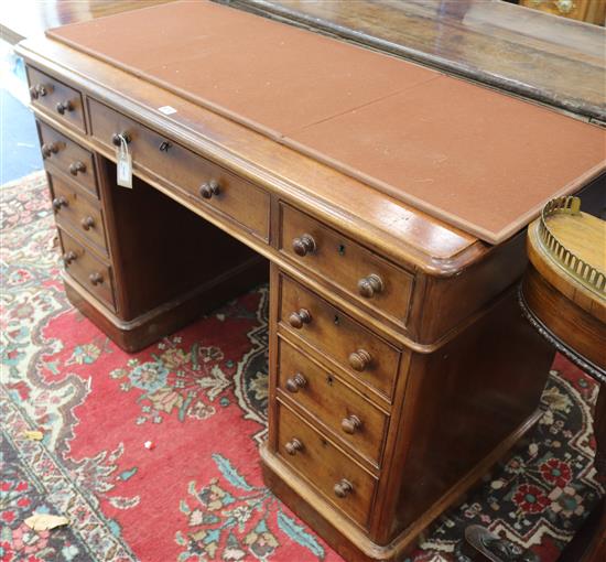 A Victorian mahogany pedestal desk fitted nine short drawers, W.122cm